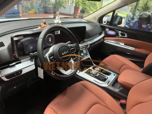 kia carnival white car for rent Business Trip in Ho Chi Minh City