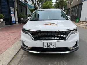 kia carnival white rent a car in Ho Chi Minh City